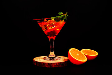 fresh mojito cocktail glass closeup shot on black background 
