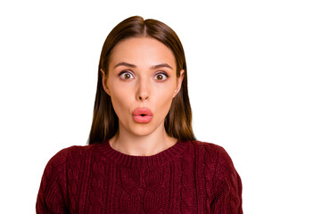 Close up photo of impressed cute frightened girl with her lips pouted by something unexpected while isolated with yellow background