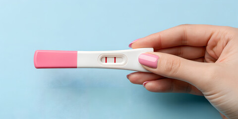 Positive pregnancy test result early detection home test kit concept