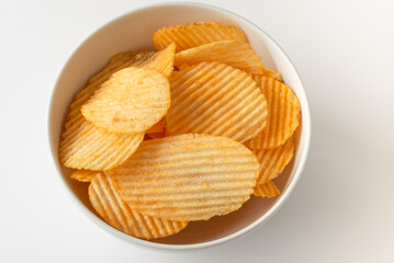 Cheddar Flavored Potato Chips in a Bowl
