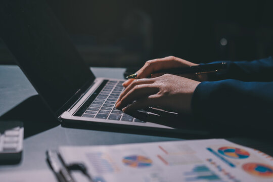 Expert woman asian female people review data number costing managerial account prepare monthly actual cost variance report at tax audit office. ESG sheet budget control ERP process service project.