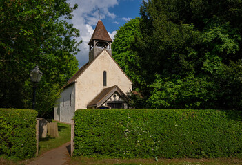 The Church of Saint Mary the Virgin in Farleigh, Surrey, UK. This ancient historic building dates back to about 1083AD.