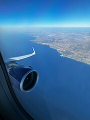 Beautiful view from the plane on the ocean coast