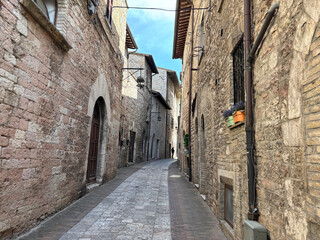 Medieval street in the Italian hill town of Assisi, Italy.