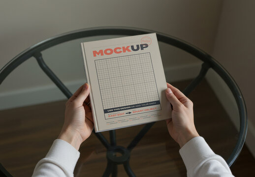 Hard Book Cover Mockup with Holding Hands