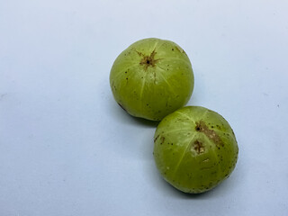 Indian gooseberries, also known as amla two fruits 