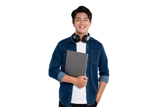 Portrait of Asian male student wearing headphones , using laptop and posing on PNG background	