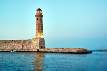 stone, historic lighthouse in the port of Rethymnon on the island of Crete