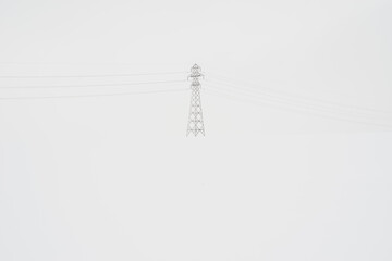 high voltage power lines in winter
