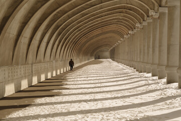 snow covered archway in soft sunlight