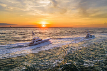 Headed to the deep sea fishing grounds at sunrise