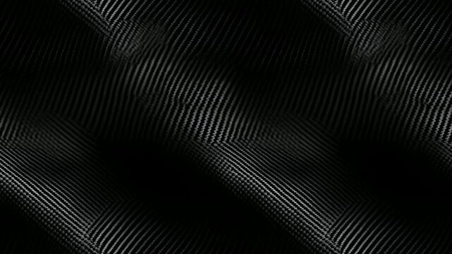 Seamless loop of black textile textures with carbon fiber and glossy fabric effects.