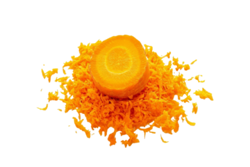 Vibrant sliced and grated carrots create a delightful visual feast on a transparent background perfect for culinary inspiration