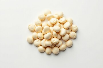 Pile of white beans against stark white backdrop, heap, food photography