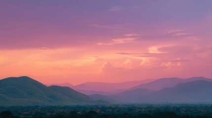 Serene Landscape of Rolling Hills Under Colorful Twilight Sky at Dusk