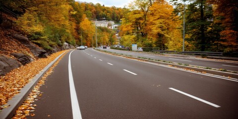 Fototapeta premium Autumn drive through scenic forest road charming town image of nature vibrant foliage panoramic view fall serenity