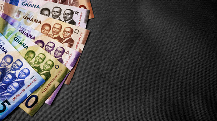 All Legal tender denominations Ghanaian cedi currency notes as of May 2025 at the side of screen on...