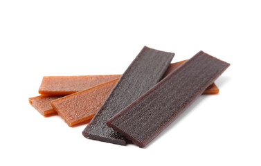 Pieces of delicious fruit leather on white background