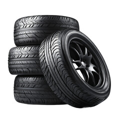 A stack of four tires with one tire leaning towards the stack