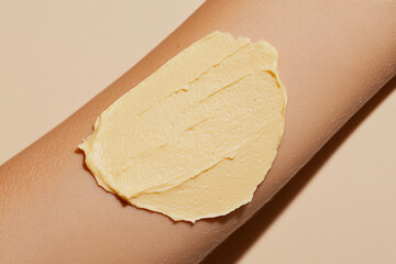 Cream applied on arm skin.