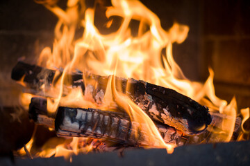 fire in a fireplace in the evening