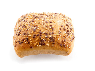 One small premium roll with seeds and grain on white background with reflection. Fine bakery product made from high quality premium ingredients, Small taste crusty bread.