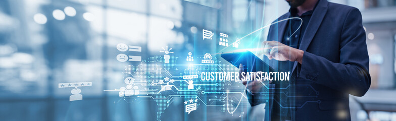 Businessman using tablet analyzing Customer Satisfaction and its impact on growth and overall business success, which leads to revenue growth and customer retention, influencing business advancement.
