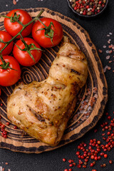 Grilled chicken leg or quarter. Barbecued meat with salt and spices