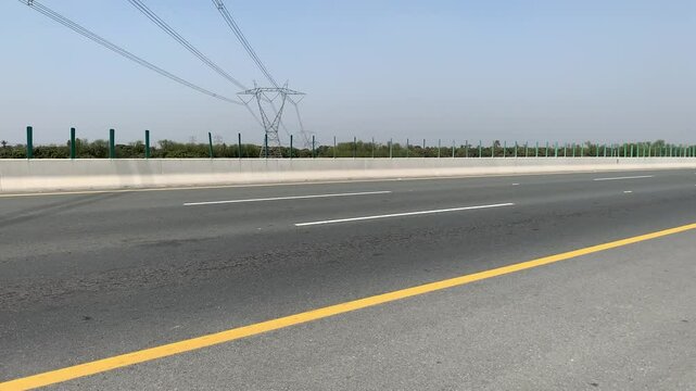 PAKISTAN PUNJAB 2024 19 MAY: Truck. Pakistani Truck on the motorway towards Lahore ring road. CPEC. China to Pakistan. loading truck with gas and oil. Transportation. Pakistani transport. Motorway M5.