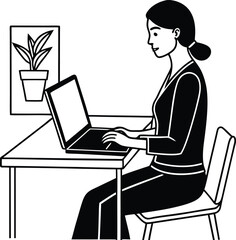 Woman working on laptop at office desk