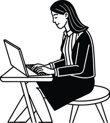 Woman working on laptop at office desk