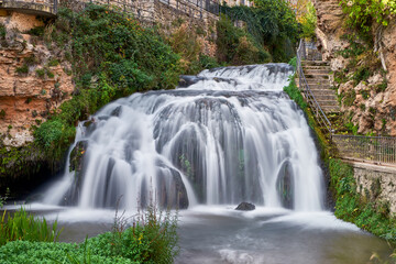 A stream cascading down through the town center