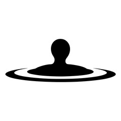 Silhouette of a person in water creating circular ripples surrounding them