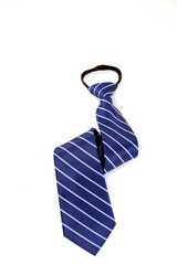 A blue zipper tie folded isolated on white background closeup view 