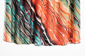 This is a vibrant and swirling printed fabric that features bold colors and abstract patterns