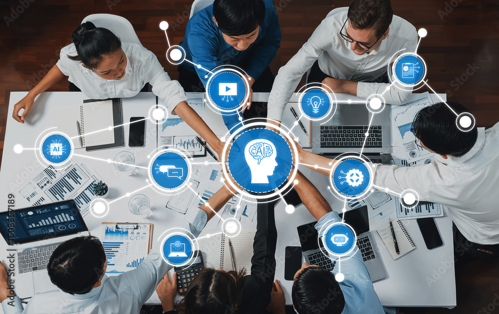 Poster A diverse team collaborates around a table, discussing artificial intelligence strategies. Laptops and charts illustrate the brainstorming process for innovative tech solutions. Amity