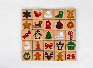 Advent Calendar. 25 Christmas cookies. White background. Top view