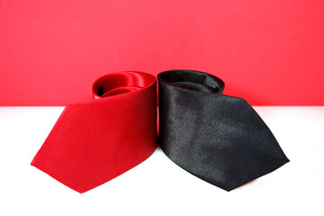 plain fabric neckties rolled together closeup view