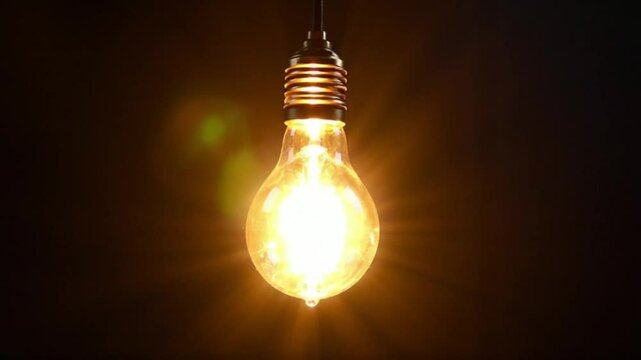 Classic Light Bulb Turning On and Off in Dark Space Close-Up in 4K