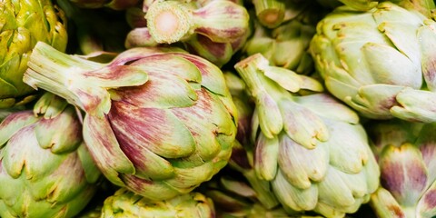 Fresh artichokes for sale at a market