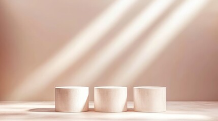 Fototapeta premium Three light beige cylinder podiums under sunbeams