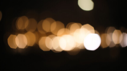 Soft bokeh lights with warm glow and out-of-focus background effect.