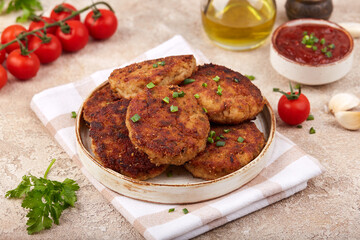 Turkey cutlets from minced meat. Pan-fried meat fritters. Healthy dinner for the family.