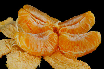 orange sliced closeup shot on black background 