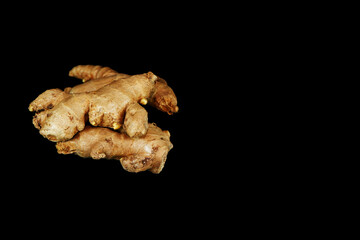 ginger root isolated on black background