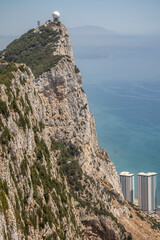 Rock of Gibraltar with Horizon and Sea. Beautiful Vertical Scenery of Stone Cliff with Water in Iberian Peninsula.