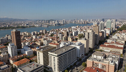 Obraz premium Aerial cityscape view of urban skyline with river