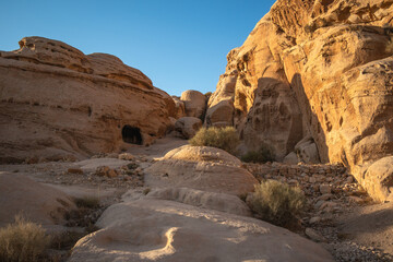 Rock Formation during Sunny Day in Petra. Beautiful Sandstone in Jordan. Middle East Stone Texture with Blue Sky.