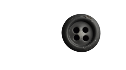 Dark vintage button with four holes isolated on transparent background