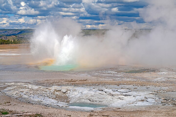 Geyser Erupting in a Volcanic Landscape